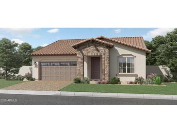 Single-story home with a terracotta tile roof, stone accents, and a two-car garage at 25176 N 174Th Ave, Surprise, AZ 85387