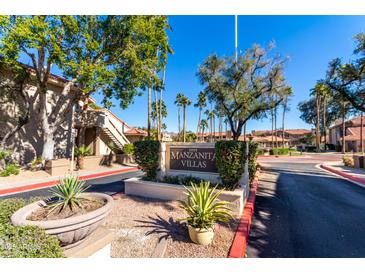 Community entrance sign for Manzanita Villas at 11515 N 91St St # 248, Scottsdale, AZ 85260