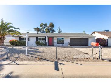 Updated single-story home with a modern exterior and landscaped yard at 15202 N 26Th St, Phoenix, AZ 85032