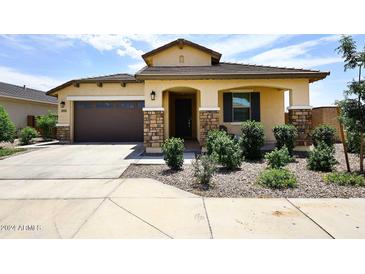 One-story home with stone accents and landscaped yard at 4249 E Sagebrush St, Gilbert, AZ 85296