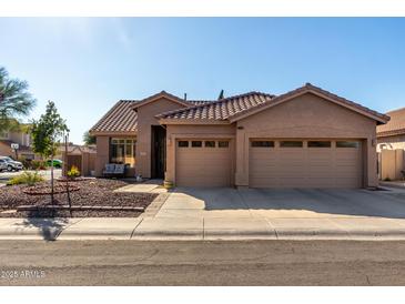 Beautiful two-story home with landscaped front yard and two-car garage at 5317 W Glenview Pl, Chandler, AZ 85226