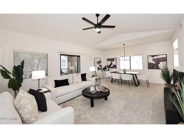 Bright living room features contemporary furniture and a neutral color palette at 9455 E Raintree Dr # 2049, Scottsdale, AZ 85260