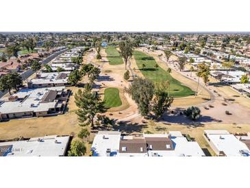 Aerial view of a community with golf course at 25244 S Saddletree Dr, Sun Lakes, AZ 85248