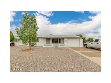 Ranch style home with gravel driveway and carport at 152 N 63Rd St, Mesa, AZ 85205