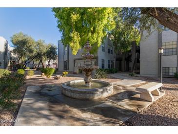 Community courtyard with fountain and seating at 8020 E Thomas Rd # 330, Scottsdale, AZ 85251