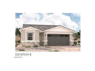 One-story home with a two-car garage and stone accents at 8333 N 54Th Ln, Glendale, AZ 85302