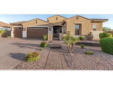 Stunning curb appeal with a brick walkway leading to the front entrance at 2827 E Bellerive Dr, Gilbert, AZ 85298