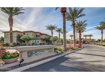 Santana Ridge community entrance with palm trees and landscaping at 3330 S Gilbert Rd # 2021, Chandler, AZ 85286