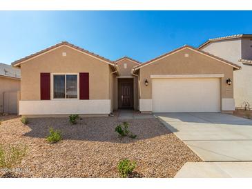 One-story house with a two-car garage and desert landscaping at 31550 N Hayweather Ln, San Tan Valley, AZ 85143