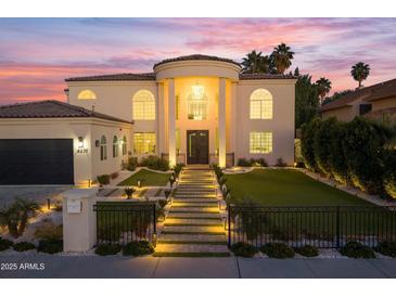 Luxury home with a grand entrance and manicured lawn at 6237 N 5Th Pl, Phoenix, AZ 85012