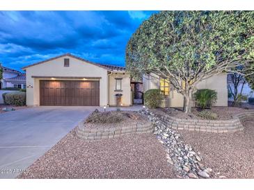 Beautiful single-story home with landscaped yard and two-car garage at 12750 W Nogales Dr, Sun City West, AZ 85375