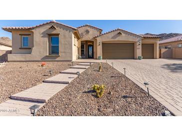 Beautiful desert landscape and two-car garage at 16221 S 35Th Dr, Phoenix, AZ 85045