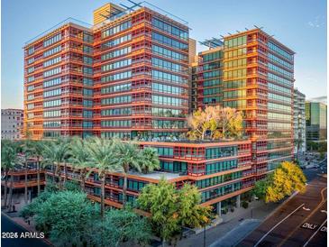 Modern high-rise building with city views and palm trees at 4808 N 24Th St # 1123, Phoenix, AZ 85016