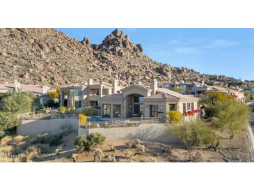 Luxury home with stunning mountain views and a resort-style backyard at 24350 N Whispering Ridge Way # 50, Scottsdale, AZ 85255