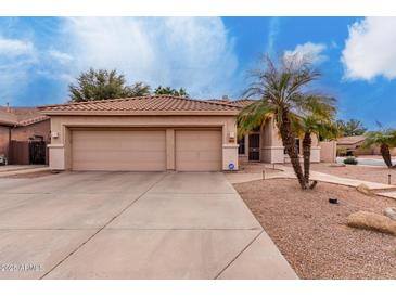 Attractive single-story home with two-car garage and desert landscaping at 2847 E Melody Ln, Gilbert, AZ 85234