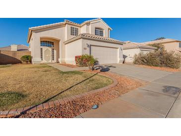 Two-story house with a two-car garage and landscaped front yard at 1220 W Gail Ct, Chandler, AZ 85224