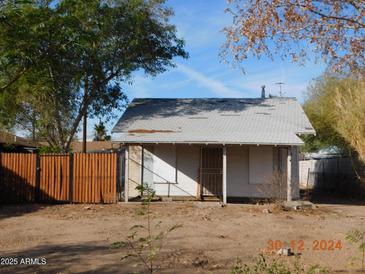 One-story house with wood siding and a front porch at 2206 N 11Th St, Phoenix, AZ 85006