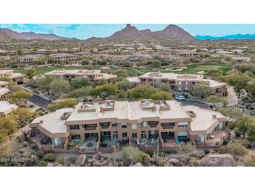 Aerial view of community building and golf course at 10222 E Southwind Ln # 1026, Scottsdale, AZ 85262