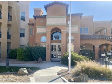 Attractive building exterior with landscaping and a well-maintained entrance at 14575 W Mountain View Blvd # 12303, Surprise, AZ 85374