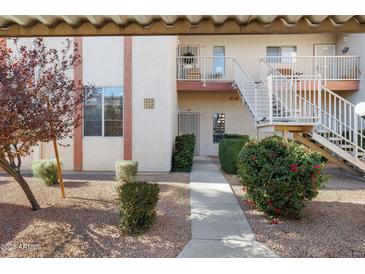 Inviting condo exterior with walkway and landscaping at 205 N 74Th St # 122, Mesa, AZ 85207