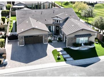 Stunning curb appeal with a 3-car garage and manicured landscaping at 2351 E Cherrywood Pl, Chandler, AZ 85249