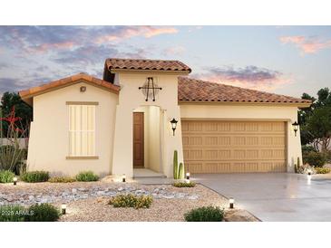 One-story home with Spanish-style tile roof, neutral-colored exterior, and landscaped front yard at 24137 W Hilton Ave, Buckeye, AZ 85326