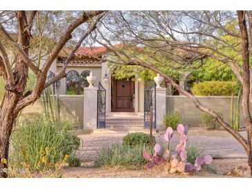 Spanish style home with gated entry and landscaped grounds at 4529 E Clearwater Pkwy, Paradise Valley, AZ 85253