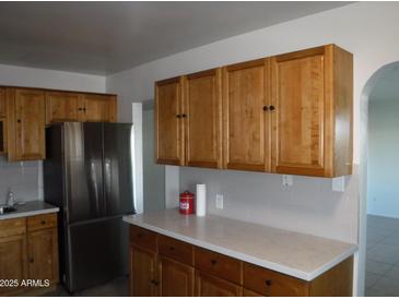 Kitchen with ample cabinetry and counter space at 5031 W Flynn Ln, Glendale, AZ 85301