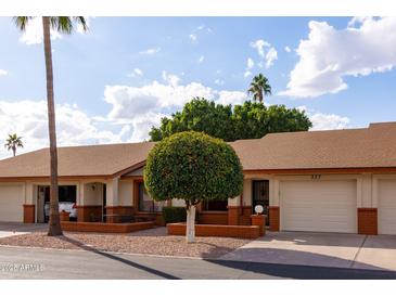 Front view of a charming single-story home with a well-maintained landscape at 8020 E Keats Ave # 327, Mesa, AZ 85209