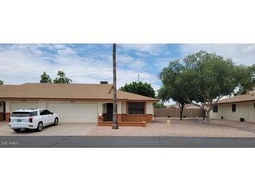 Single-level home with two-car garage and landscaped yard at 8020 E Keats Ave # 314, Mesa, AZ 85209