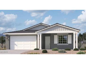 One-story home with gray siding, white garage door, and landscaping at 22852 E Lords Way, Queen Creek, AZ 85142