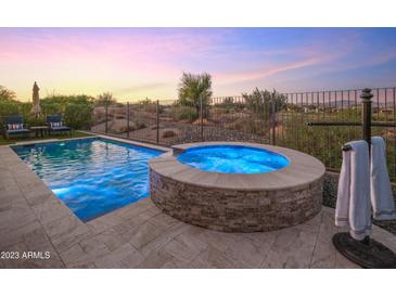 Relaxing backyard oasis with a sparkling pool and spa, perfect for entertaining at 18022 E Vista Desierto --, Rio Verde, AZ 85263