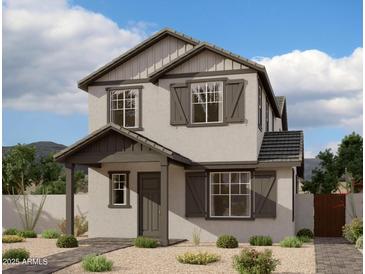 Two-story home with gray siding, dark brown accents, and landscaping at 26111 N 23Rd Ave, Phoenix, AZ 85085