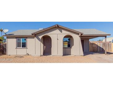 Cute single story home with carport and spacious yard at 6936 W Berkeley Rd, Phoenix, AZ 85035