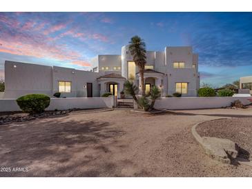 Stunning two-story home with stucco exterior and desert landscaping at 8158 E Plymouth St, Mesa, AZ 85207