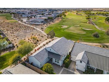 Aerial view showcasing a house and golf course at 11746 N San Clemente St, Surprise, AZ 85388