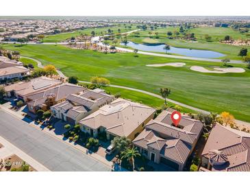 Aerial view of a house on a golf course community at 1401 E Sweet Citrus Dr, Queen Creek, AZ 85140