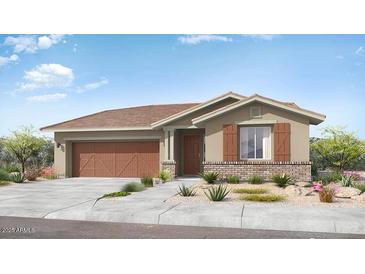 Single-story home with brown garage doors and brick accents at 14832 W Cottontail Ln, Surprise, AZ 85387