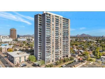 High-rise building with city views and mountain backdrop at 2323 N Central Ave # 502, Phoenix, AZ 85004