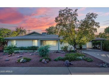 Charming single-story home with landscaped front yard at 8201 E Monterey Way, Scottsdale, AZ 85251