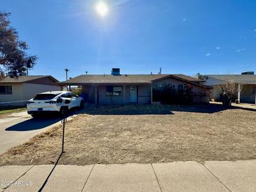 Ranch style home with a spacious yard at 2239 E Wier Ave, Phoenix, AZ 85040