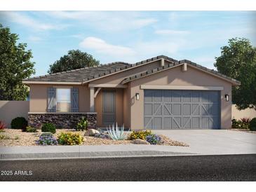 One-story home with gray garage doors and stone accents at 22551 W Pontiac Dr, Surprise, AZ 85387
