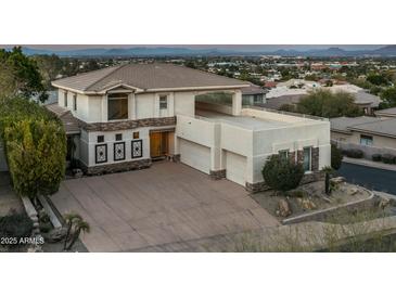 Luxury home with stunning city views and a large driveway at 2646 E Spring Rd, Phoenix, AZ 85032