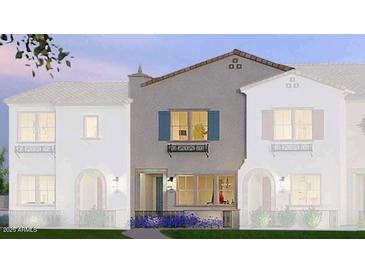 Two-story townhome with light-gray siding, teal shutters, and landscaping at 2658 S Sulley Dr # 109, Gilbert, AZ 85295