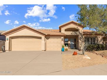 Two-car garage and desert landscaping of this beautiful home at 14806 E Crested Crown --, Fountain Hills, AZ 85268