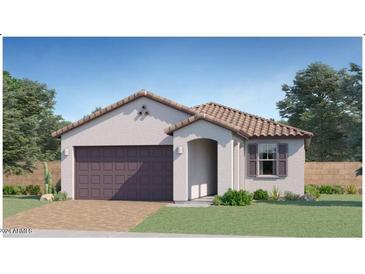 Single-story home with attached garage and desert landscaping at 15673 W Winslow Ave, Goodyear, AZ 85338