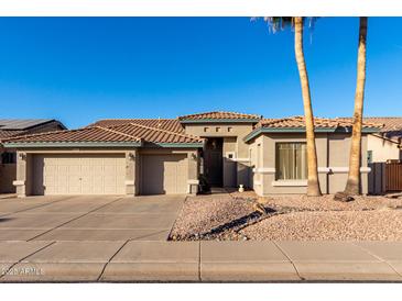 Two-story house with a two-car garage and desert landscaping at 474 E Sheffield Ave, Gilbert, AZ 85296