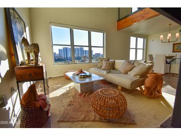 Relaxing living room with large windows offering city views at 1326 N Central Ave # 416, Phoenix, AZ 85004