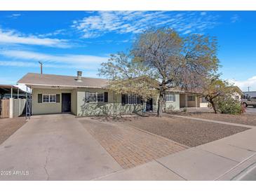 Charming single story home with a landscaped front yard at 1710 E 1St St, Mesa, AZ 85203
