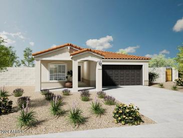 Single-story home with a tile roof, two-car garage, and desert landscaping at 18118 W Sand Hills Dr, Surprise, AZ 85387